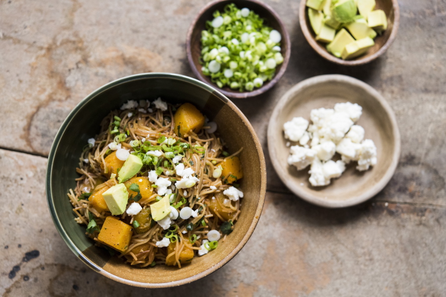 This image released by Milk Street shows a recipe for sopa seca w/butternut squash .