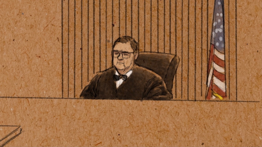In this courtroom sketch, U.S. District Judge Paul Magnuson presides over a pretrial hearing for three former Minneapolis officers charged in the death of George Floyd, in federal court on Tuesday, Jan.11, 2022 in St. Paul, Minn. Floyd died in May 2020 after Derek Chauvin pressed his knee against his neck as Floyd, who was handcuffed, said he couldn't breathe. Tou Thao, J. Kueng and Thomas Lane are charged that they deprived Floyd of his rights while acting under government authority. Thao and Kueng are also charged with willfully depriving Floyd of his right to be free from unreasonable force by failing to stop fellow Officer Chauvin from pressing his knee into Floyd's neck.