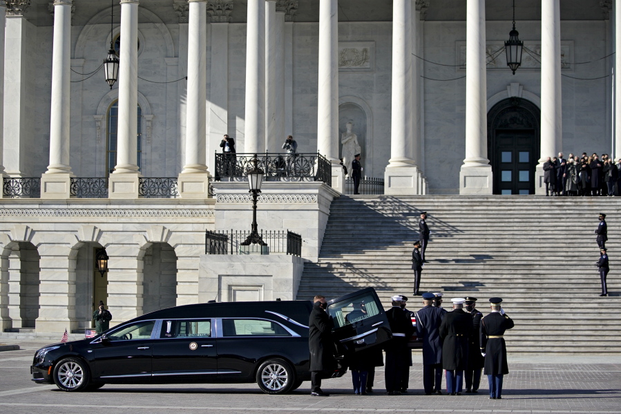 The flag-draped casket of the late Sen. Harry Reid, D-Nev., arrives at the U.S. Capitol where he will lie in state, Wednesday, Jan. 12, 2022 in Washington. Reid, who served five terms in the Senate, will be honored Wednesday in the Capitol Rotunda during a ceremony closed to the public under COVID-19 protocols.