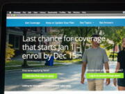 The healthcare.gov website is seen, Tuesday, Dec. 14, 2021 in Fort Washington, Md. Some 14.5 million Americans got health insurance for this year under the Obama-era health law, President Joe Biden said Thursday.