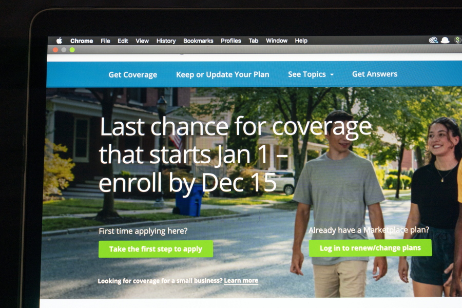 The healthcare.gov website is seen, Tuesday, Dec. 14, 2021 in Fort Washington, Md. Some 14.5 million Americans got health insurance for this year under the Obama-era health law, President Joe Biden said Thursday.