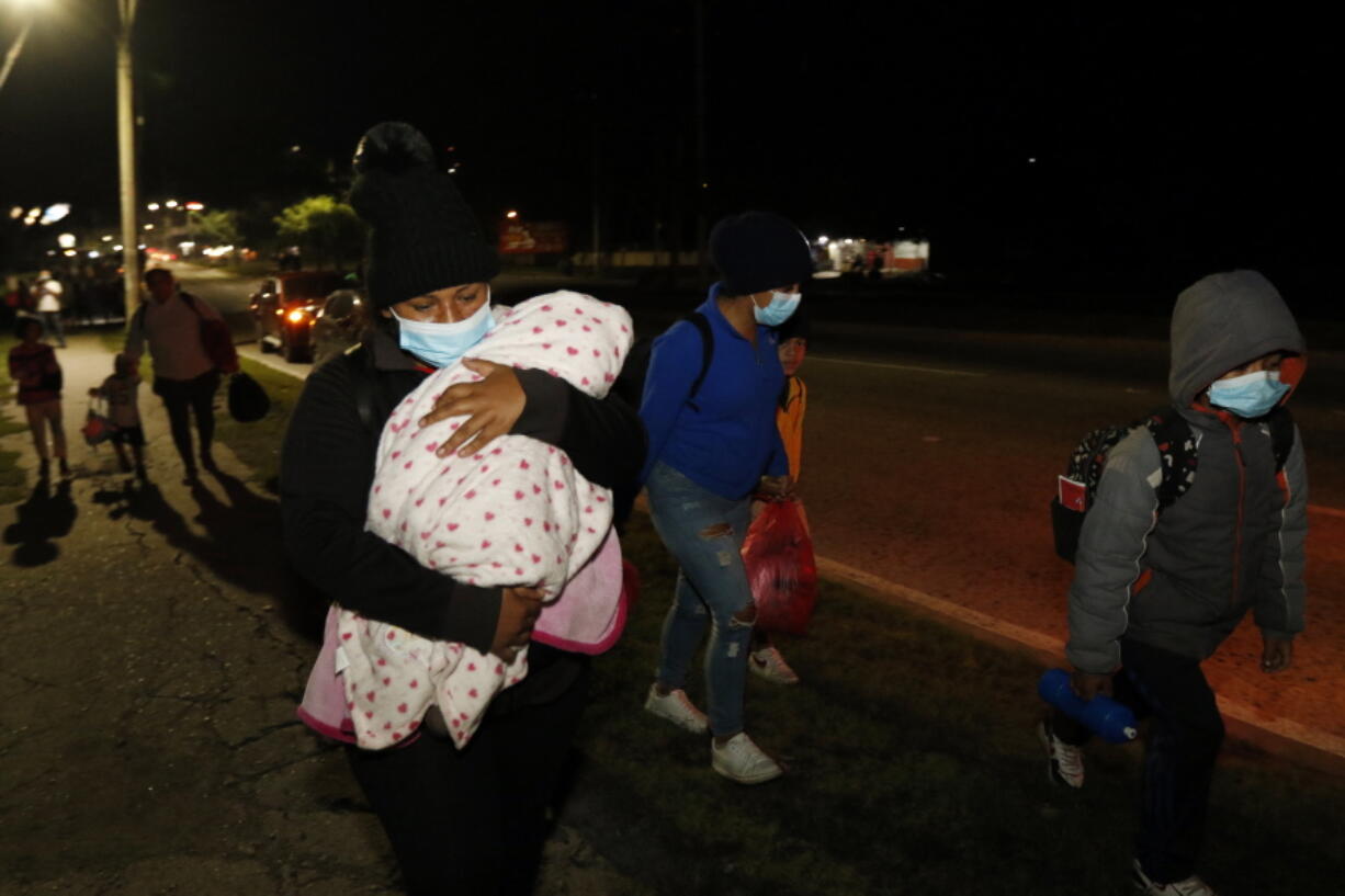 Members of a 600-migrant caravan begin their journey Saturday in San Pedro Sula, Honduras, hoping to reach the United States.