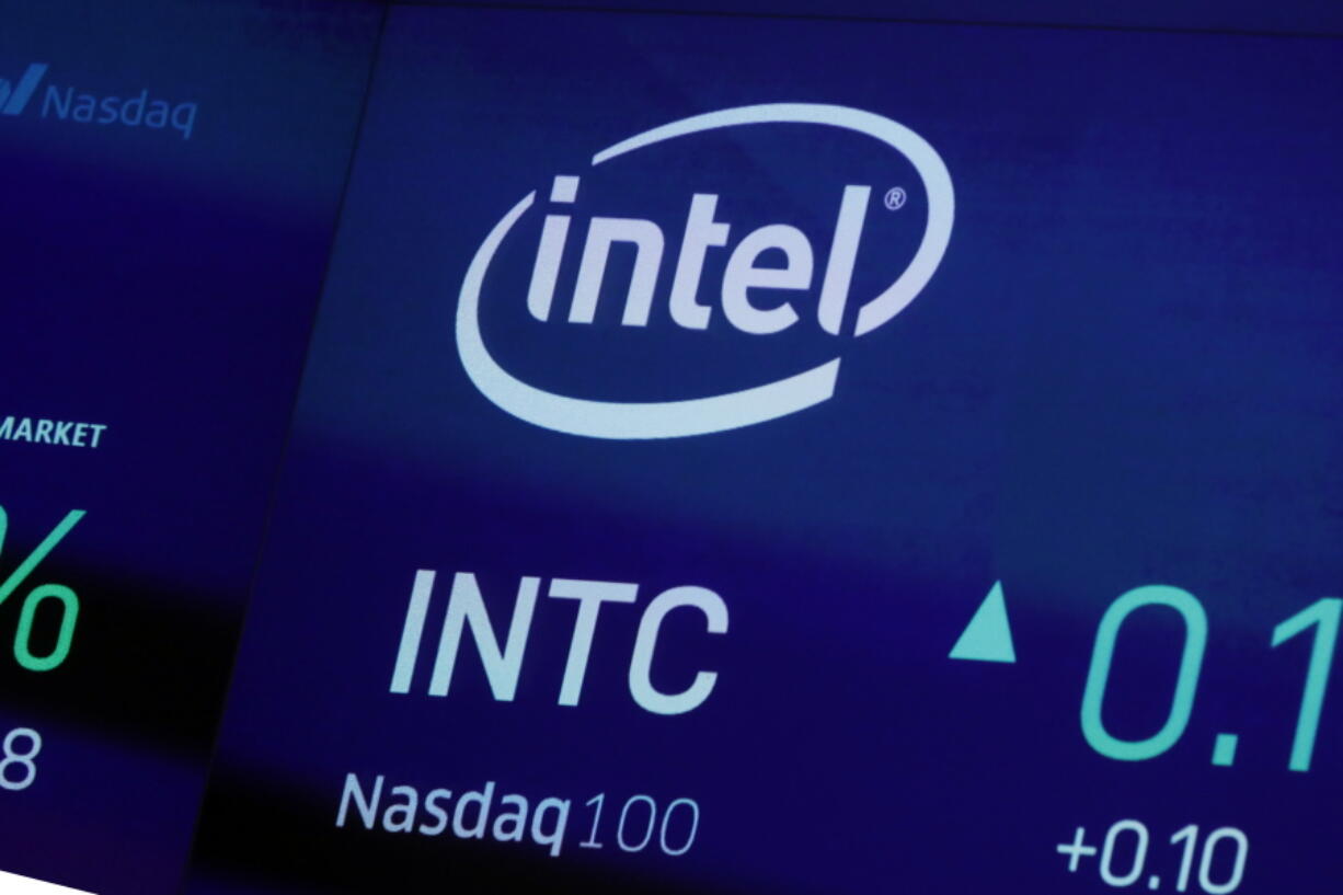 FILE - In this Oct. 1, 2019, file photo the symbol for Intel appears on a screen at the Nasdaq MarketSite, in New York. Intel Corp. is planning an initial investment of more than $20 billion for two semiconductor chip plants in central Ohio to help address a global shortage of semiconductor chips. The plants are expected to create 3,000 Intel jobs and 7,000 construction jobs over the course of the build, and to support tens of thousands of additional local long-term jobs across a broad ecosystem of suppliers and partners.