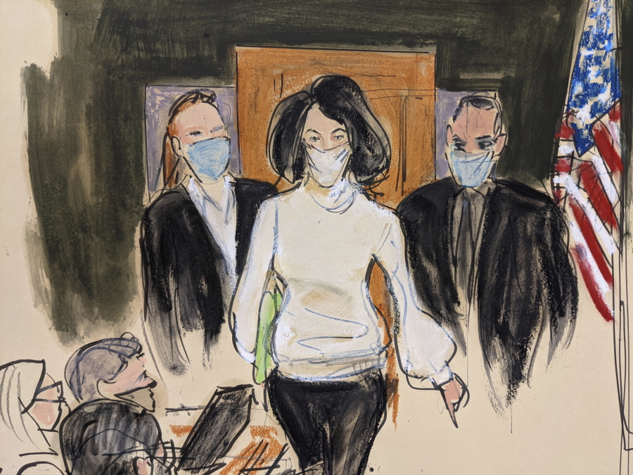 In this courtroom sketch, Ghislaine Maxwell enters the courtroom escorted by U.S. Marshalls at the start of her trial, Monday, Nov. 29, 2021, in New York.  A late-June sentencing date was set Friday, Jan 14, 2022, for Maxwell following her conviction last month on charges including sex trafficking and conspiracy relating to the recruitment of teenage girls for financier Jeffrey Epstein to sexually abuse.