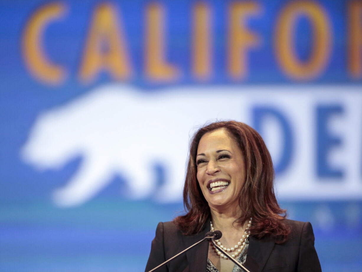 FILE - Then California State Attorney General Kamala Harris speaks to California Democrats at the California Democrats State Convention in Anaheim, Calif., on Saturday, May 16, 2015. Vice President Kamala Harris is returning to California to highlight federal wildfire programs. Harris will be in San Bernardino on Friday, Jan. 21, 2022, to spotlight federal dollars for disaster relief, including $600 million from the Forest Service for California.
