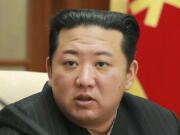 FILE - In this photo provided by the North Korean government, North Korean leader Kim Jong Un attends a meeting of the Central Committee of the ruling Workers' Party in Pyongyang, North Korea on Jan. 19, 2022. North Korea on Tuesday, Jan. 25, 2022 test-fired two suspected cruise missiles in its fifth round of weapons launches this month, South Korean military officials said, as it attempts to display its military might amid pandemic-related difficulties and a prolonged freeze in nuclear negotiations with the United States.