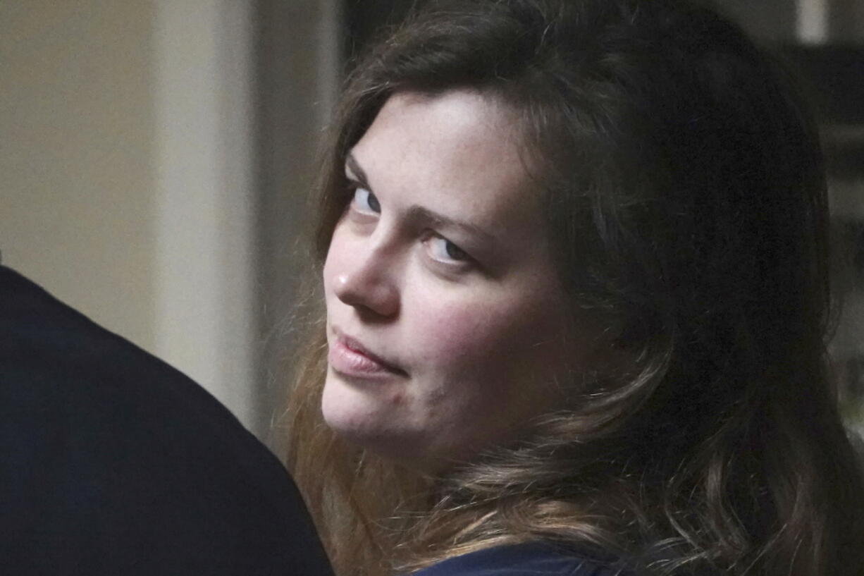 FILE - Hannah Roemhild, who is accused of driving through checkpoints outside President Donald Trump's Florida home Mar-a-Lago, looks back during her initial appearance hearing, Monday, Feb. 3, 2020, West Palm Beach, Fla.  Roemhild has been found not guilty by reason of insanity. Florida prosecutors agreed Tuesday, Jan.
