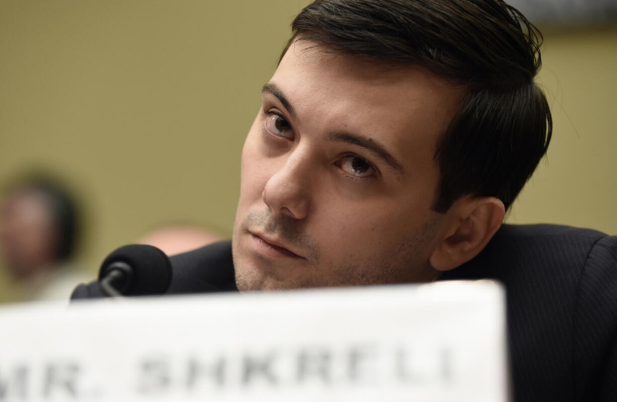 FILE - Former Turing Pharmaceuticals CEO Martin Shkreli attends the House Committee on Oversight and Reform Committee hearing on Capitol Hill in Washington, Feb. 4, 2016. A federal judge on Friday, Jan. 14, 2022 ordered Shkreli to return $64.6 million in profits he and his company reaped from inflating the price of the life-saving drug Daraprim and barred him from participating in the pharmaceutical industry for the rest of his life.