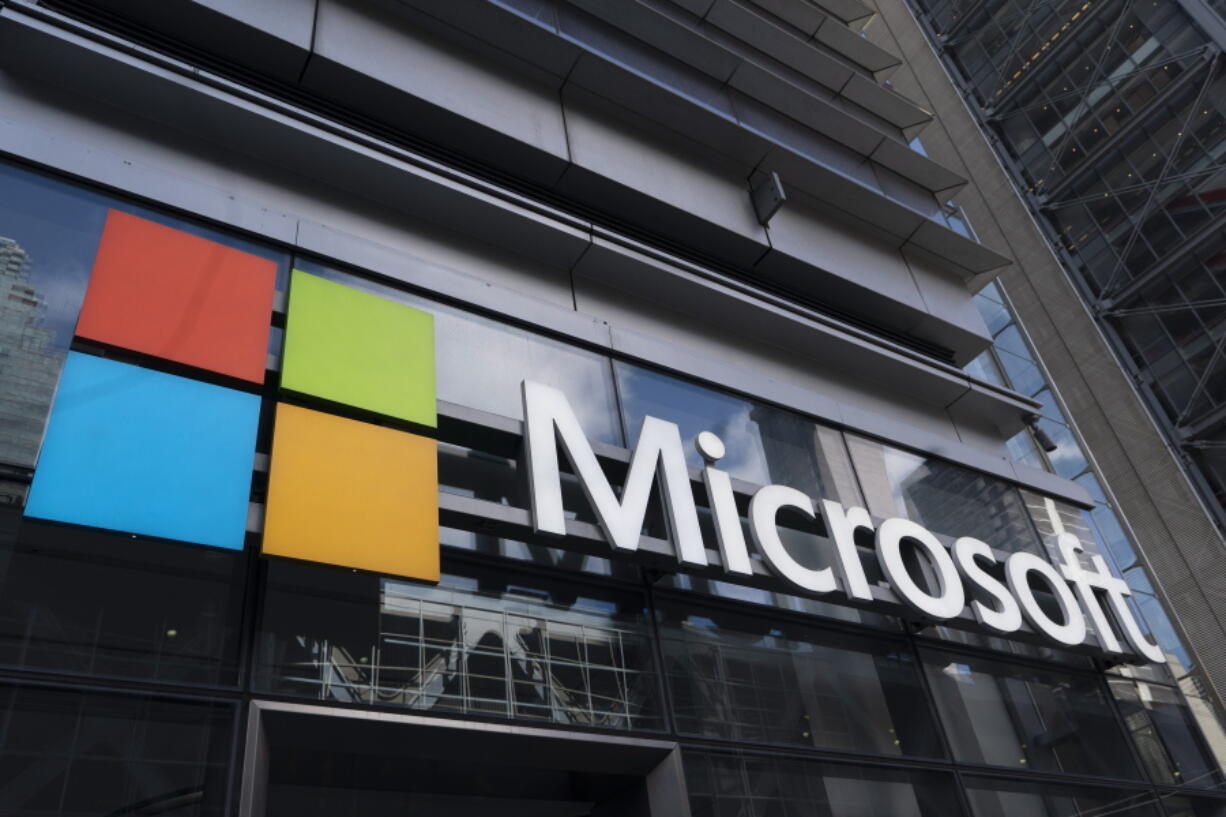 A sign for Microsoft offices, Thursday, May 6, 2021 in New York. Microsoft stunned the gaming industry when it announced, Tuesday, Jan. 18, 2022, it would buy game publisher Activision Blizzard for $68.7 billion, a deal that would immediately make it a larger video-game company than Nintendo.