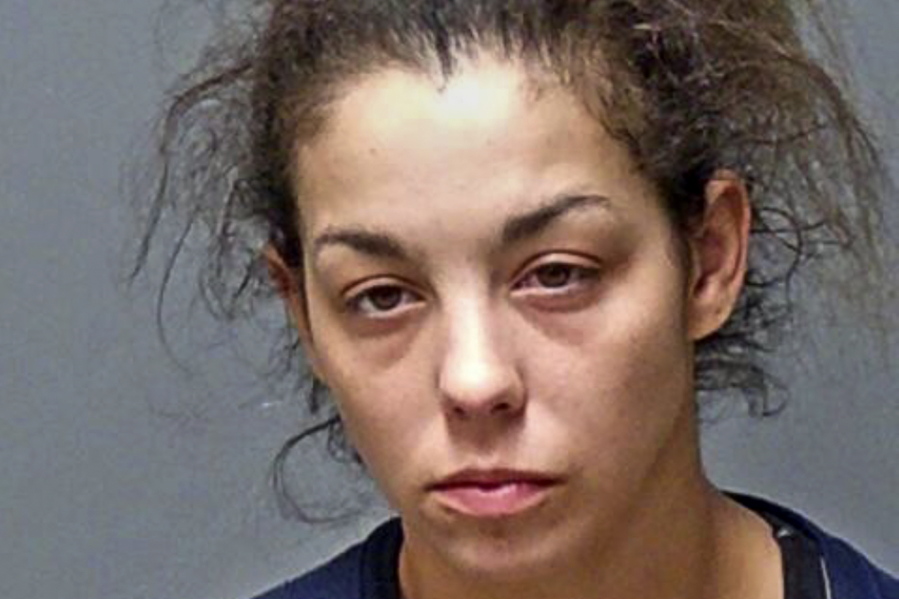 This booking photograph provided by the N.H. Attorney General's office shows Kayla Montgomery, 31, of Manchester, New Hampshire, who was arrested on January 5, 2022, in Manchester. Montgomery, wife of a man whose daughter went missing in 2019, has been charged with welfare fraud for collecting food stamps in her name, the New Hampshire attorney general's office said Thursday Jan. 6, 2022. (N.H.