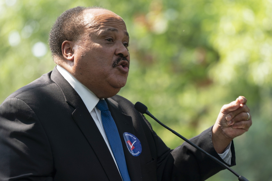 FILE - Martin Luther King III speaks during a rally for voting rights, Tuesday, Sept. 14, 2021, on Capitol Hill in Washington. As communities across the nation prepare to mark the birthday of the Rev. Martin Luther King, Jr., some members of his family are spending it in conservative-leaning Arizona to mobilize support for languishing federal voting rights legislation. Martin Luther King III, his wife and their 13-year-old daughter will take part Saturday, Jan.