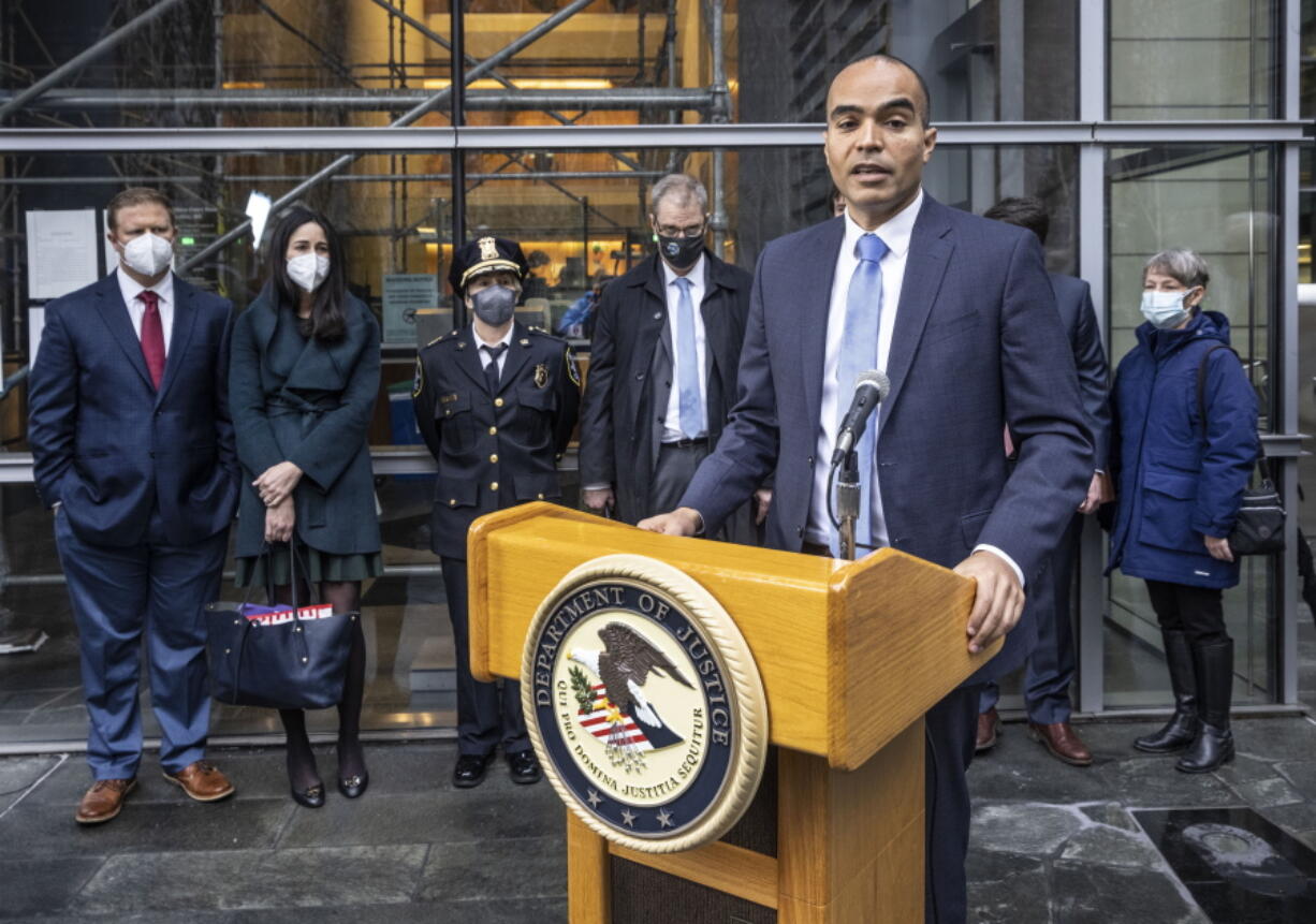 U.S. Attorney Nick Brown speaks on the steps of Federal Court, Tuesday, Jan. 11, 2022, in Seattle along with leadership from the FBI and Seattle Police Department about the Atomwaffen hate campaign following the sentencing of Kaleb Cole.
