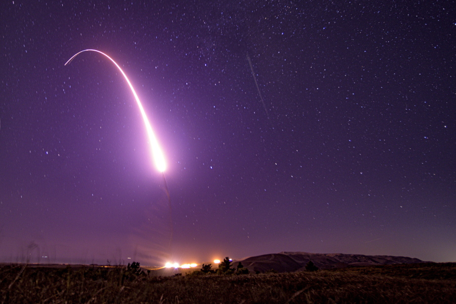 FILE - This image taken with a slow shutter speed on Oct. 2, 2019, and provided by the U.S. Air Force shows an unarmed Minuteman 3 intercontinental ballistic missile test launch at Vandenberg Air Force Base, Calif. Major shifts in U.S. nuclear weapons policy seem much less likely, and while President Joe Biden may insist on certain adjustments, momentum toward a historic departure from the Trump administration's policy appears to have stalled. The outlook will be clearer when the Biden administration completes its so-called nuclear posture review - an internal relook at the numbers, kinds and purposes of weapons in the nuclear arsenal, as well as the policies that govern their potential use. The results could be made public as early as January.(Staff Sgt. J.T. Armstrong/U.S.