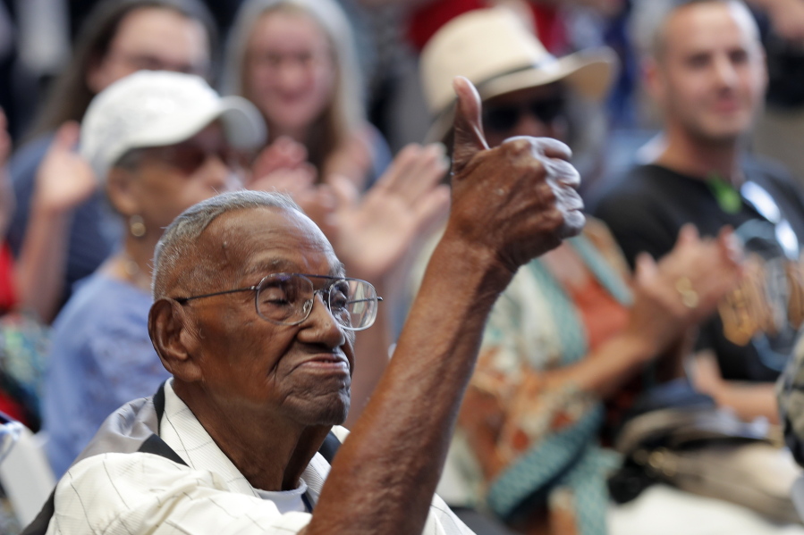 FILE - In this Sept. 12, 2019 file photo, World War II veteran Lawrence Brooks celebrates his 110th birthday at the National World War II Museum in New Orleans.  Brooks, the oldest World War II veteran in the U.S. -- and believed to be the oldest man in the country -- died on Wednesday, Jan. 5, ,2022 at the age of 112.