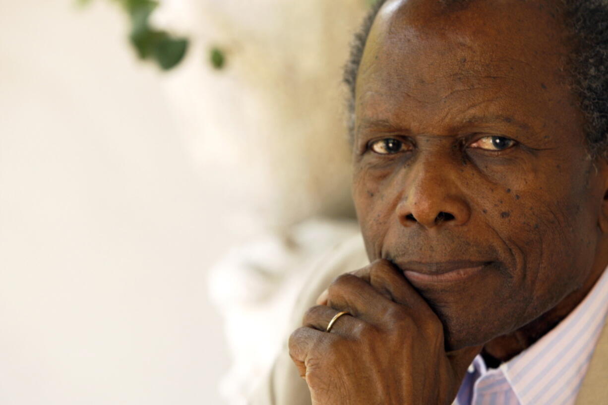 FILE - Actor Sidney Poitier poses for a portrait in Beverly Hills, Calif. on June 2, 2008.  Poitier, the groundbreaking actor and enduring inspiration who transformed how Black people were portrayed on screen, became the first Black actor to win an Academy Award for best lead performance and the first to be a top box-office draw, died Thursday, Jan. 6, 2022 in the Bahamas. He was 94.