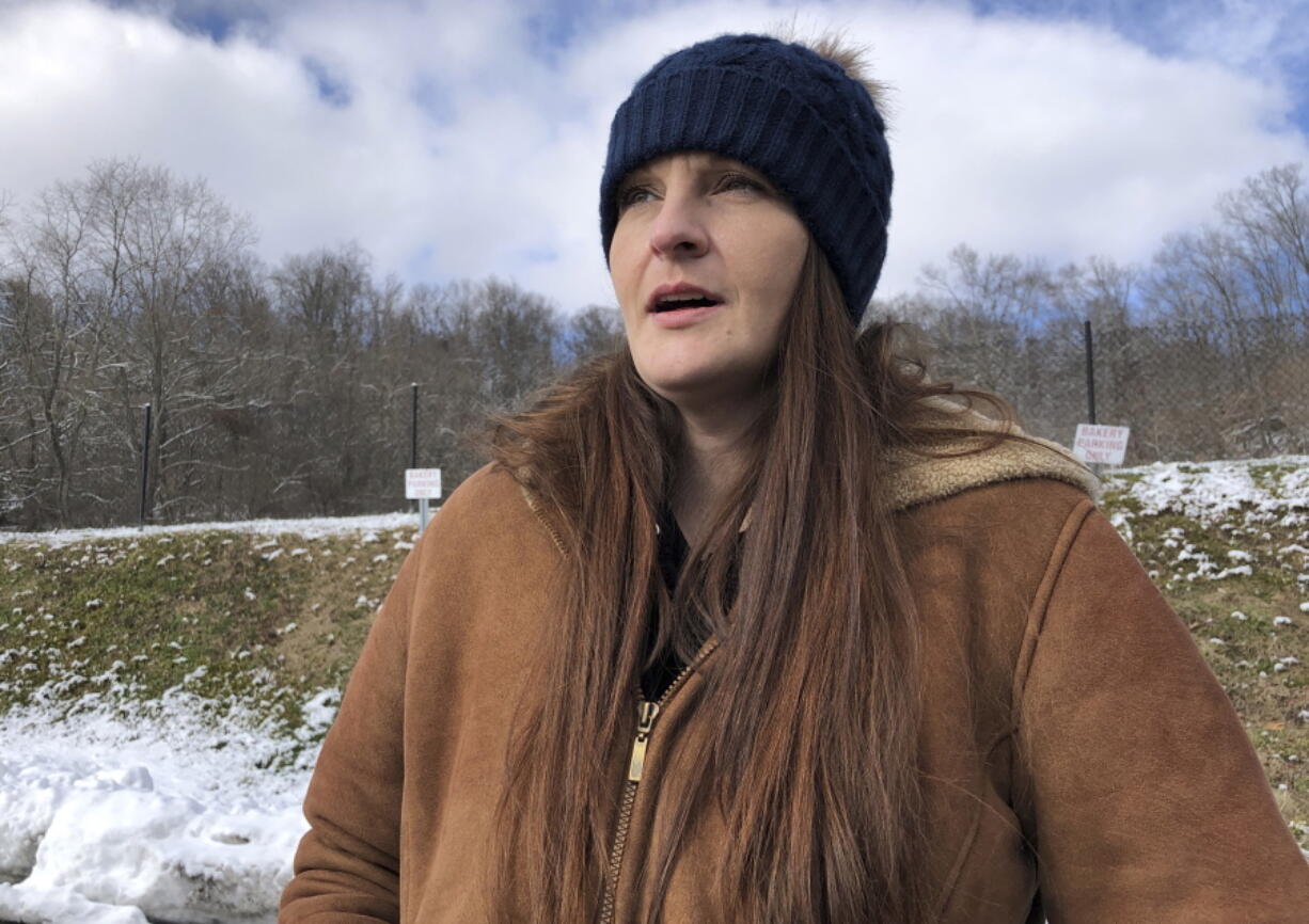 Sarah Kelly is shown Friday, Jan. 21, 2022, in Huntington, W.Va. After struggling with an opioid addiction most of her life, Kelly has been in recovery since October 2019. As a federal judge mulls a decision in a lawsuit filed by the city of Huntington and Cabell County over the role of three pharmaceutical companies in the local opioid crisis, Kelly said there are many recovery programs that could benefit if the plaintiffs prevail.
