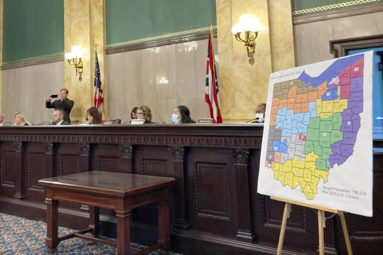 FILE--Members of the Ohio Senate Government Oversight Committee hear testimony on a new map of state congressional districts in this file photo from Nov. 16, 2021, at the Ohio Statehouse in Columbus, Ohio. On Friday, Jan. 14, 2022, the Ohio Supreme Court rejected a new map of the state's 15 congressional districts as gerrymandered, sending the blueprint back for another try. The 4-3 decision returns the process to the powerful Ohio Redistricting Commission.