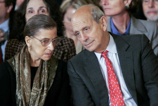 FILE - Supreme Court Associate Justices Ruth Bader Ginsburg, left, and Stephen Breyer talk prior to a ceremonial swearing-in ceremony for new Supreme Court Justice Samuel Alito in the East Room of the White House, Feb. 1, 2006.
