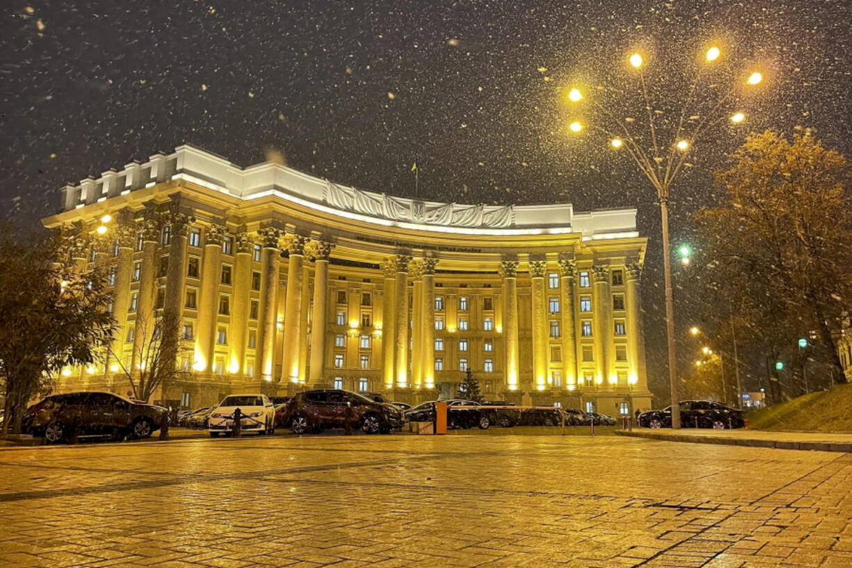In this undated handout photo released by Ukrainian Foreign Ministry Press Service, the building of Ukrainian Foreign Ministry is seen during snowfall in Kyiv, Ukraine. Ukrainian officials and media reports say a number of government websites in Ukraine are down after a massive hacking attack. While it is not immediately clear who was behind the attacks, they come amid heightened tensions with Russia and after talks between Moscow and the West failed to yield any significant progress this week.