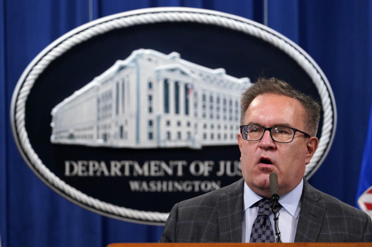 FILE - Environmental Protection Agency (EPA) Administrator Andrew Wheeler speaks, during a news conference at the Justice Department in Washington, on Sept. 14, 2020. Republican Virginia Gov.-elect Glenn Youngkin has tapped the former coal lobbyist and Trump administration Environmental Protection Agency chief to join his cabinet in a role overseeing the state's environmental policy. Youngkin's transition announced Wednesday, Jan. 5, 2022, that Wheeler is his pick for secretary of natural resources.