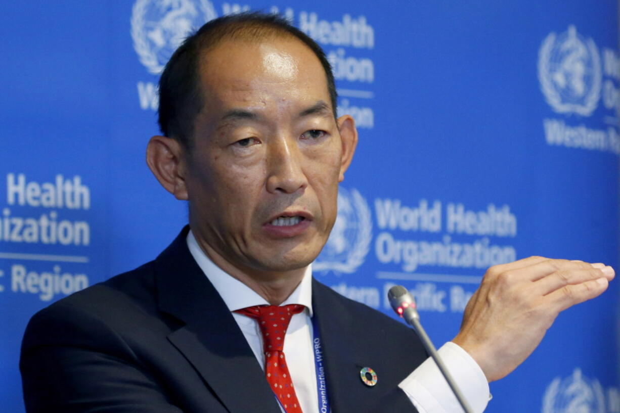 FILE - World Health Organization Regional Director for Western Pacific Takeshi Kasai addresses the media at the start of the five-day annual session Monday, Oct. 7, 2019, in Manila, Philippines. Current and former staffers have accused Kasai of racist, unethical and abusive behavior that has undermined the U.N. health agency's efforts to curb the coronavirus pandemic. The allegations were laid out in an internal complaint filed in October 2021 and an email in January 2022 sent by unidentified "concerned WHO staff" to senior leadership and the executive board. Kasai denies the charges.