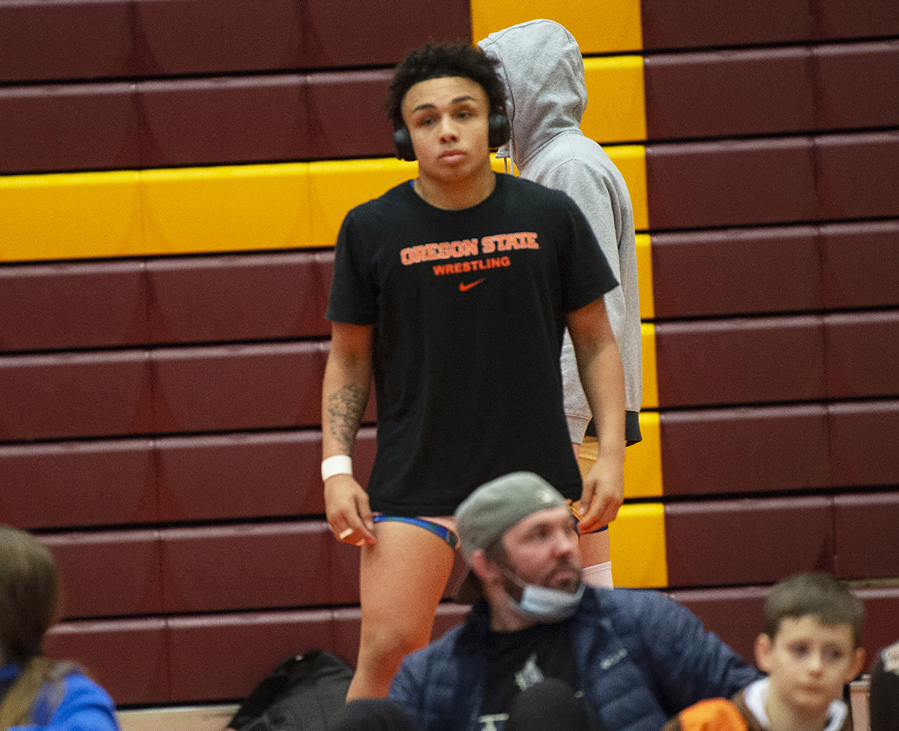 Mountain View's CJ Hamblin, sporting his Oregon State wrestling T-shirt, awaits for match to begin at the 3A district wrestling tournament.
