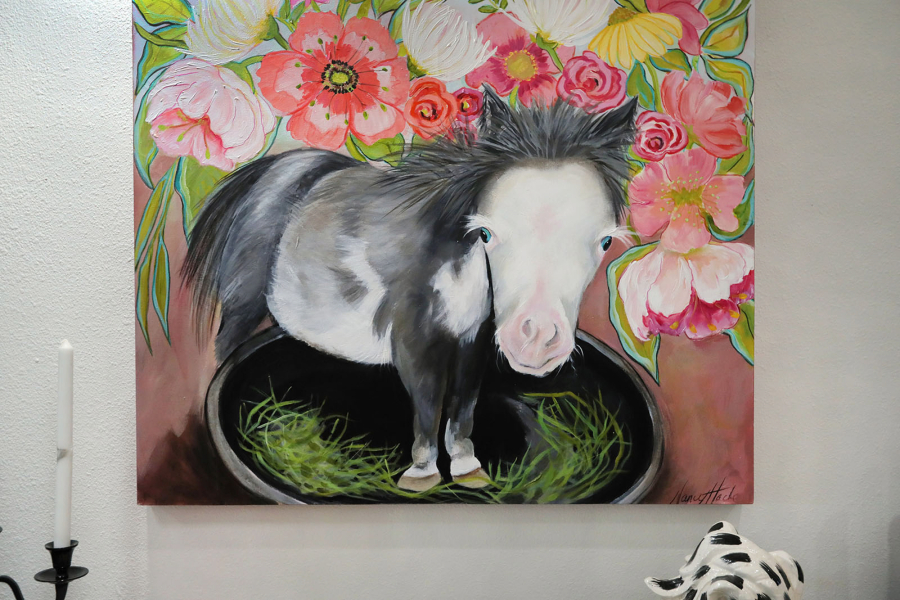 A painting by artist Nancy Hache of Peabody, a miniature horse with dwarfism, whose videos generated more than 600 million views on social media for Faithful Friends Mini Horses in Bonsall. Peabody died last fall at four months of age.