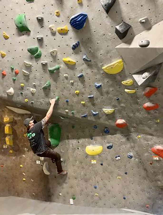 Dylan Lipke practices his bouldering skills at Bend Rock Gym.