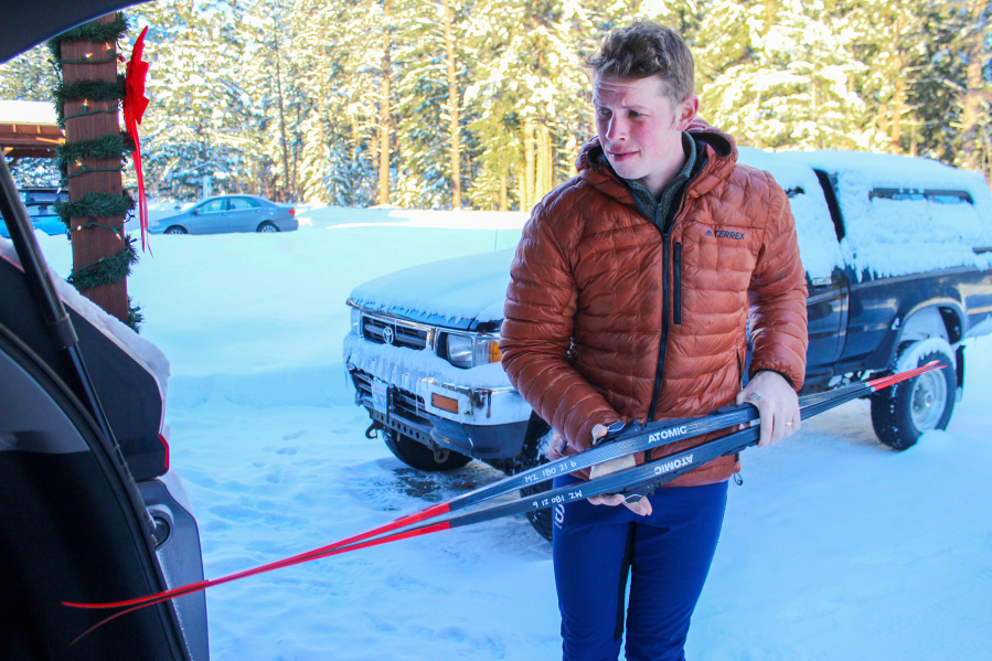 Nordic instructor Chris Moore prepares for a day of teaching ski lessons outside the home in Mazama, Washington, that he and his partner purchased below market rate through the Methow Housing Trust.