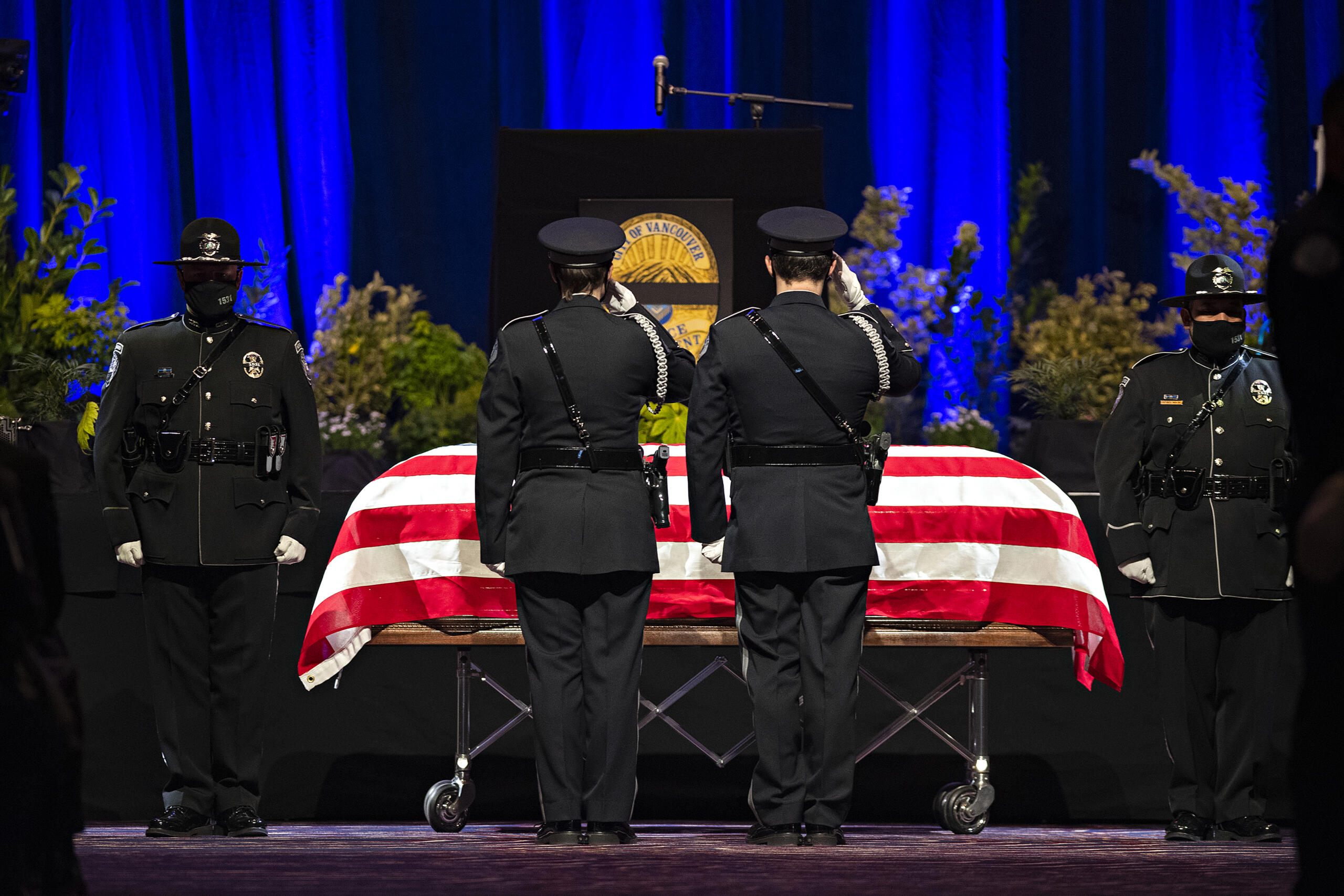 Law enforcement officers pay tribute to Officer Donald Sahota at ilani Casino Resort on Tuesday afternoon, Feb. 8, 2022. Sahota, 52, was mistakenly shot at his home near Battle Ground by a Clark County sheriff during a manhunt for a robbery suspect.