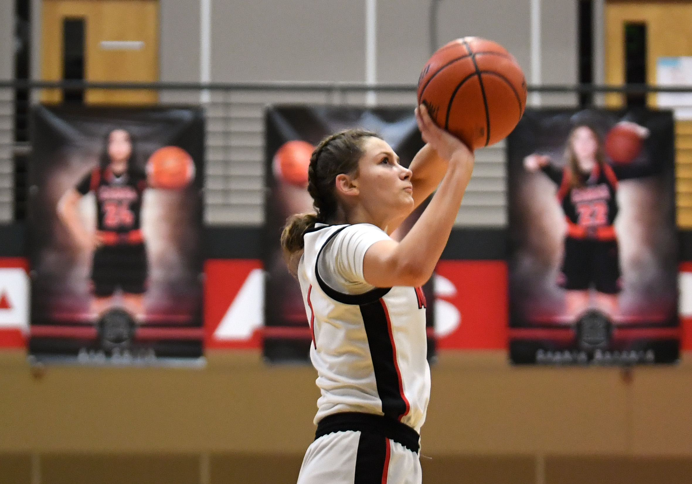 Camas sophomore Reagan Jamison shoots a three-pointer Friday, Feb. 11, 2022, during the Papermakers’ 65-34 win against Rogers-Puyallup at Camas High School.