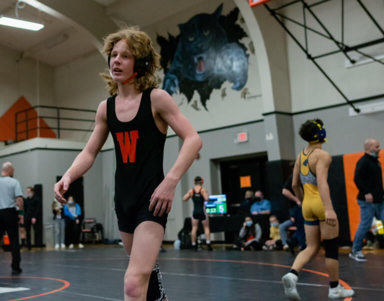 Washougal's Brody Davis walks off the mat a champion after defeating Aberdeen's Talatheon Warners at 106 pounds in the 2A Region 3 Wrestling Tournament on Saturday, Feb. 12, 2022, at Washougal High School.