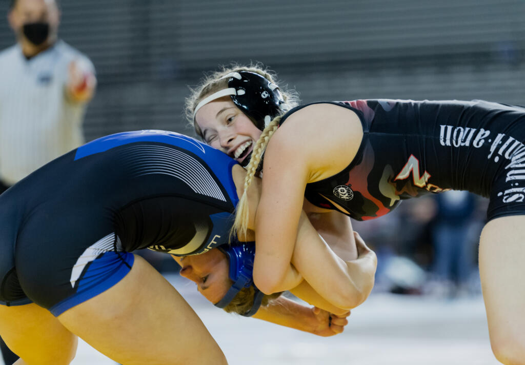 Union's Niah Cassidy grapples with Walla Walla's Kylie-May Kemp in a second-round victory at Mat Classic XXXIII on Friday, Feb. 18, at the Tacoma Dome.