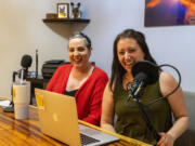 Meredith Pena, left, and Deanna Berger laugh at Pena's house in Orchards. Despite not having prior podcasting experience, the two women felt passionate and inspired to share their journey through breast cancer diagnosis with others. When they first started, they both spoke into a single microphone. "We kind of learned as we went, and our sound quality gets better as we go," Pena said.