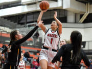 Camas sophomore Reagan Jamison shoots against Inglemoore during the Papermakers' 56-44 playoff win at Battle Ground High School.