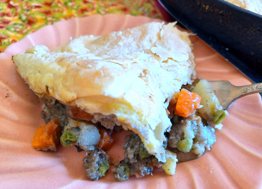 The flavors in this hearty potpie come together with a little cream of mushroom soup.