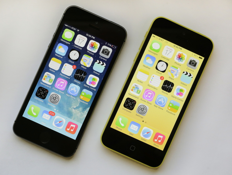 The iPhone 5S, left, and iPhone 5c are displayed, Sept. 17, 2013, in New York. As telecom companies rev up the newest generation of mobile service, called 5G, they're shutting down old networks -- a costly, years-in-the-works process that's now prompting calls for a delay because a lot of products out there still rely on the old standard, 3G. AT&T in mid-February is the first to shut down the 3G network, which first launched in the U.S. just after the turn of the millennium. AT&T says a delay in retiring the network will hurt its service quality.
