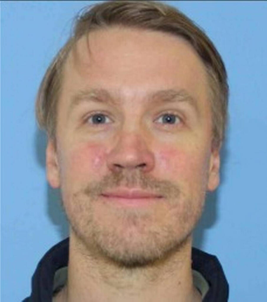 This undated photo released by the Richland, Wash., Police Department shows suspect Aaron Christopher Kelly. Police say the 39-year-old was detained late Monday night, Feb. 7, 2022, on I-90 near Spokane just before midnight. Police in the city of Richland where the shooting happened in a Fred Meyer store, say Kelly will be booked into the Benton County Jail on charges of first-degree murder and first-degree attempted murder. The shooting left one man dead and the other man hospitalized in critical condition.