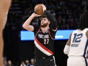 Portland Trail Blazers center Jusuf Nurkic (27) shoots the ball against the Memphis Grizzlies in the first half of an NBA basketball game Wednesday, Feb. 16, 2022, in Memphis, Tenn.