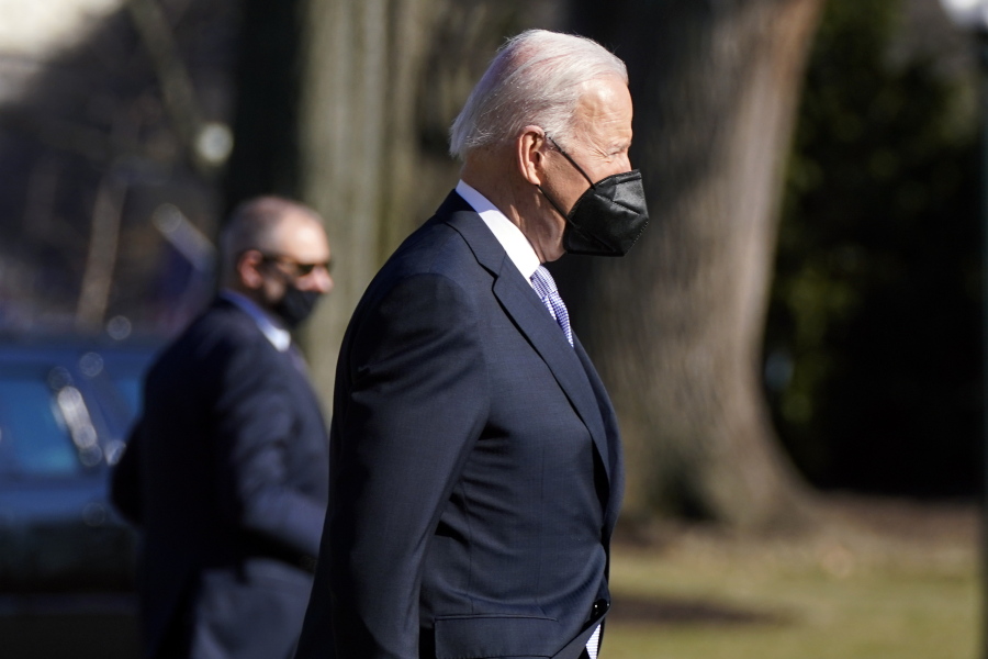 President Joe Biden walks to board Marine One on the South Lawn of the White House, Friday, Feb. 11, 2022, in Washington to travel to Camp David, Md.