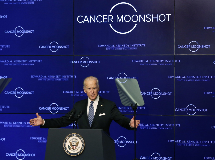 FILE - Vice President Joe Biden speaks at the Edward M. Kennedy Institute for the United States Senate, on Oct. 19, 2016 in Boston, about the White House's cancer "moonshot" initiative.