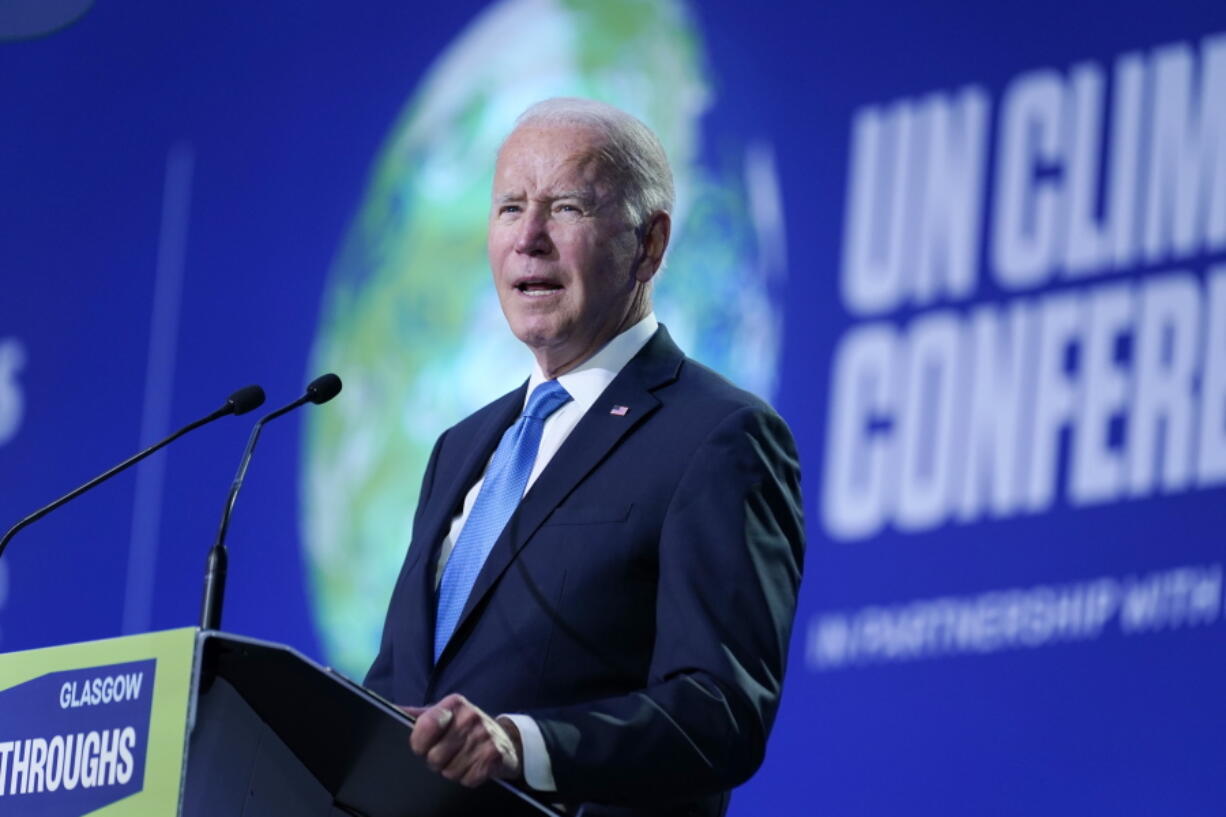 FILE - President Joe Biden speaks during the "Accelerating Clean Technology Innovation and Deployment" event at the COP26 U.N. Climate Summit, Nov. 2, 2021, in Glasgow, Scotland. A federal judge in Louisiana on Friday, Feb. 11, 2022, blocked the Biden administration's move to increase the government's cost estimate of future damages caused by greenhouse gas emissions, a key component of federal rules for oil and gas drilling, automobiles and other industries.