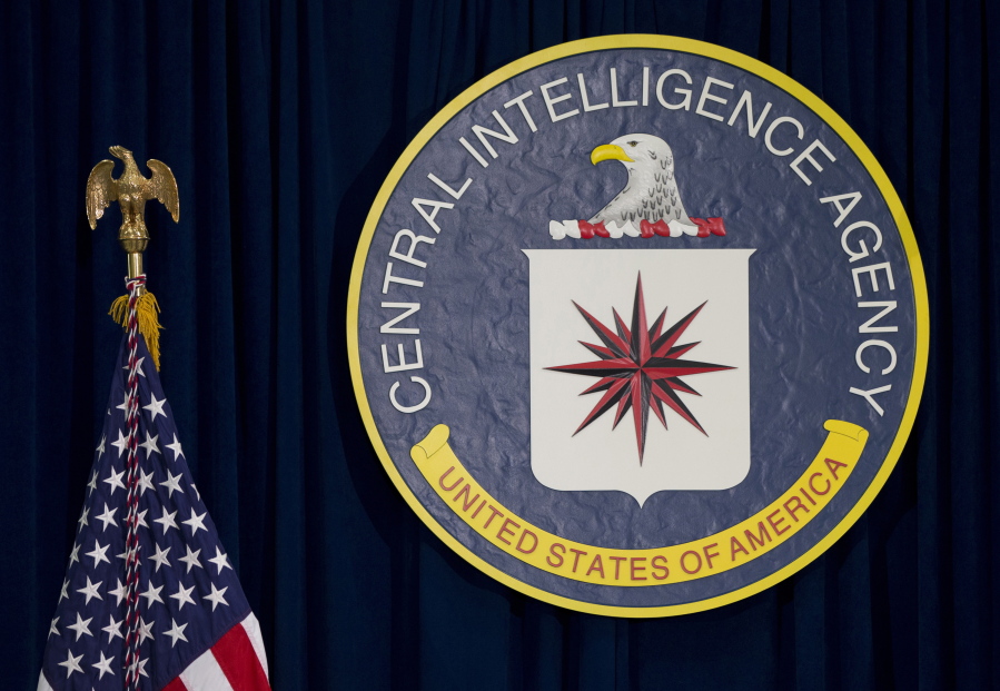 FILE - This April 13, 2016, photo, shows the seal of the Central Intelligence Agency at CIA headquarters in Langley, Va. Two Democrats on the Senate Intelligence Committee say the CIA has a secret, undisclosed data repository that includes information collected about Americans. While neither the agency nor lawmakers would disclose specifics about the data, Sens. Ron Wyden and Martin Heinrich allege the CIA has long hidden details about the program from the public and Congress.