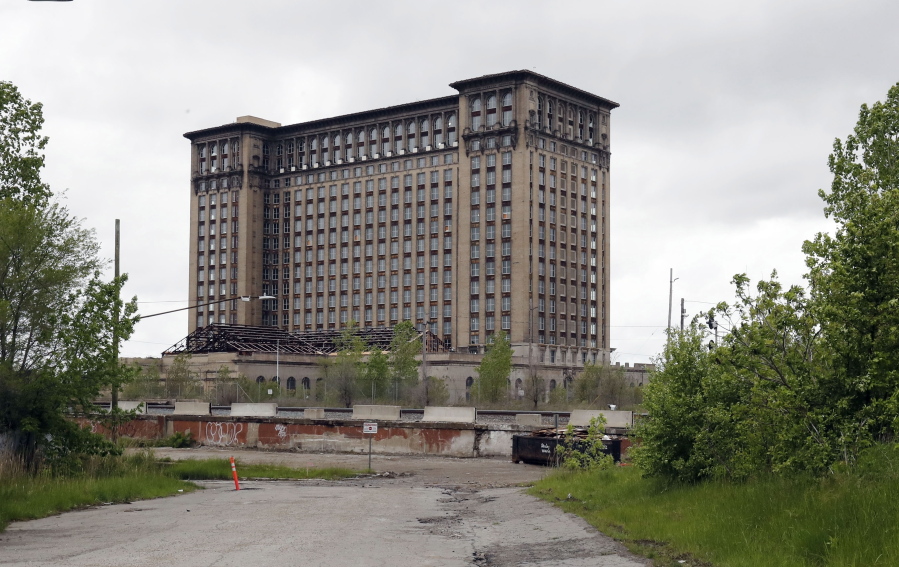 File -- Exterior view of the Michigan Central train depot, shown May 23, 2019, in Detroit. Ford Motor Co. announced Friday, Feb. 4, 2022, that Google is joining the automaker's effort to transform a once-dilapidated Detroit train station into a research hub focused on electric and self-driving vehicles.