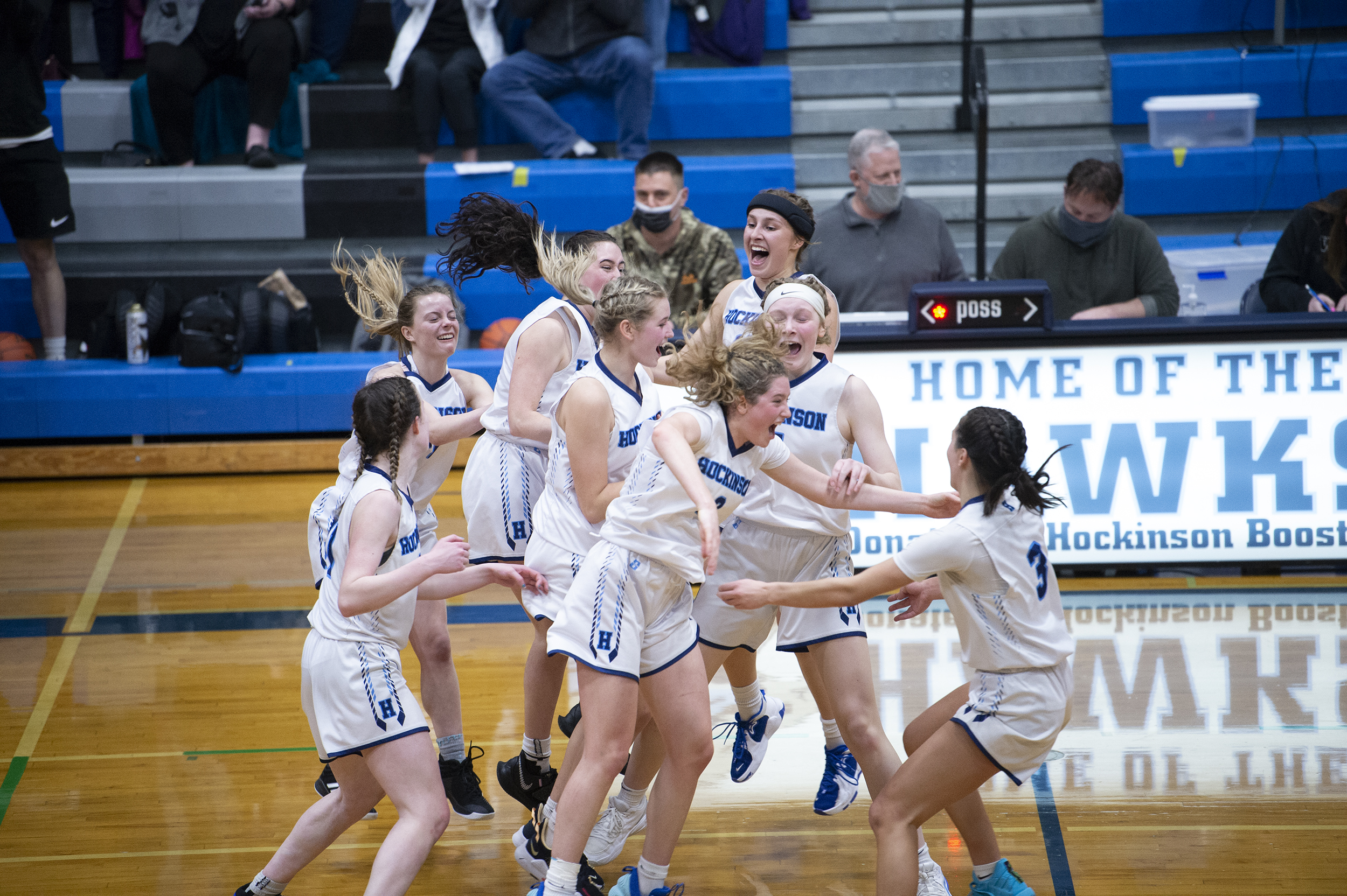 The Hockinson girls basketball players celebrate after their 58-53 win over Washougal on Wednesday, Feb.