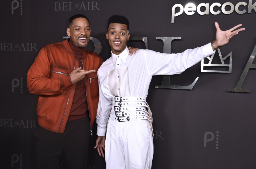 Will Smith, left, and Jabari Banks arrive at the premiere of "Bel-Air" on Wednesday, Feb. 9, 2022, at the Barker Hanger in Santa Monica, Calif.