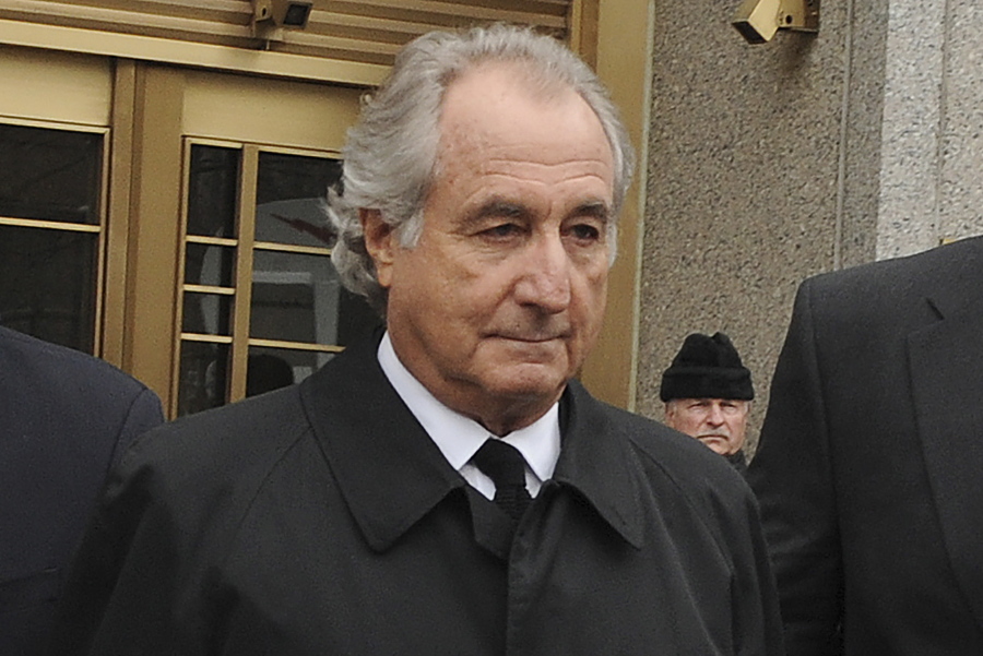 FILE - Bernie Madoff exits Manhattan federal court, March 10, 2009, in New York. Authorities have identified a couple found dead in what investigators said was an apparent murder-suicide in Florida as Madoff's sister and her husband. The Palm Beach County Sheriff's Office on Sunday, Feb. 20, 2022 identified the couple as 87-year-old Sondra Wiener of Boynton Beach and her 90-year-old husband, Marvin. They were found unresponsive with gunshot wounds Thursday afternoon inside their residence.