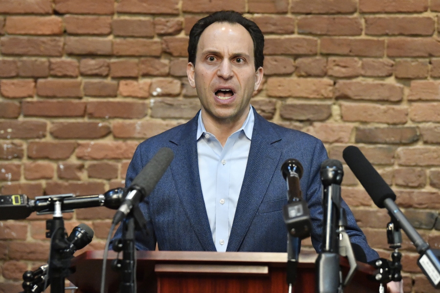 CORRECTS SPELLING TO GREENBERG, INSTEAD OF GREENBURG - Louisville Democratic mayoral candidate Craig Greenberg speaks during a news conference in Louisville, Ky., Monday, Feb. 14, 2022. Greenberg was shot at Monday morning at a campaign office but was not struck, though a bullet grazed a piece of his clothing, police said. (AP Photo/Timothy D.