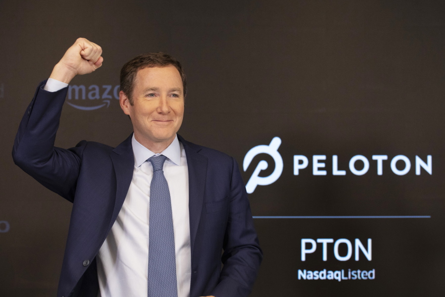 FILE - Peloton CEO John Foley celebrates at the Nasdaq MarketSite before the opening bell and his company's IPO, Sept. 26, 2019 in New York. Activist investor Blackwells Capital is asking Peloton to remove CEO John Foley and consider selling the company just a few days after a media report said the exercise and treadmill company was temporarily halting production of its connected fitness products amid waning consumer demand.