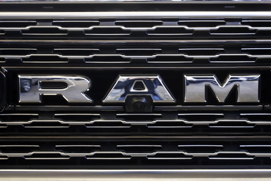 FILE - This Feb. 14, 2019, file photo shows the Ram logo at the 2019 Pittsburgh International Auto Show in Pittsburgh.   Stellantis is recalling nearly 202,000 Ram heavy-duty pickups and chassis cabs to tighten a loose nut that can stop the windshield wipers from working properly. The recall, Thursday, Feb. 3, 2022, covers certain Ram 2500 and 3500 pickups and some 3500, 4500 and 5500 chassis cabs. They're all from 2019 and 2020, and most are in the U.S. and Canada.   (AP Photo/Gene J.